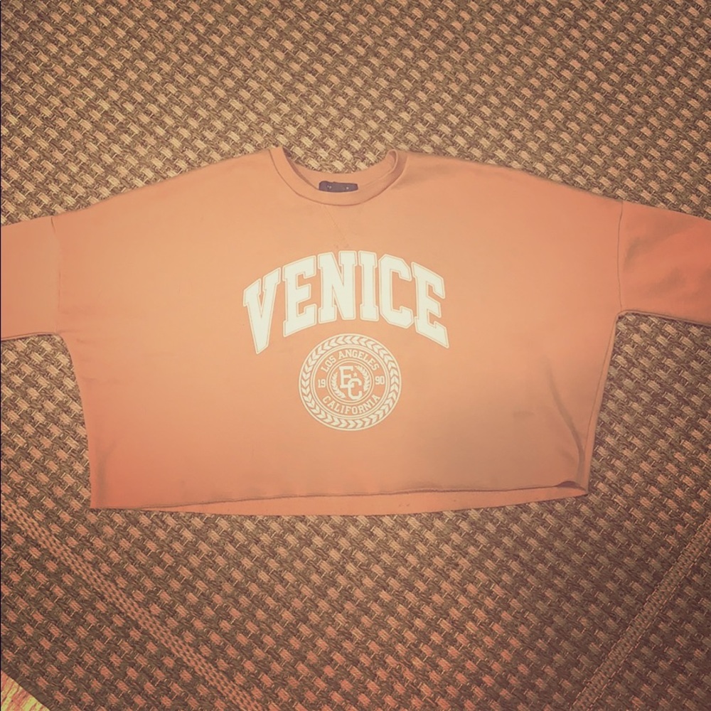Cropped long sleeve sweater